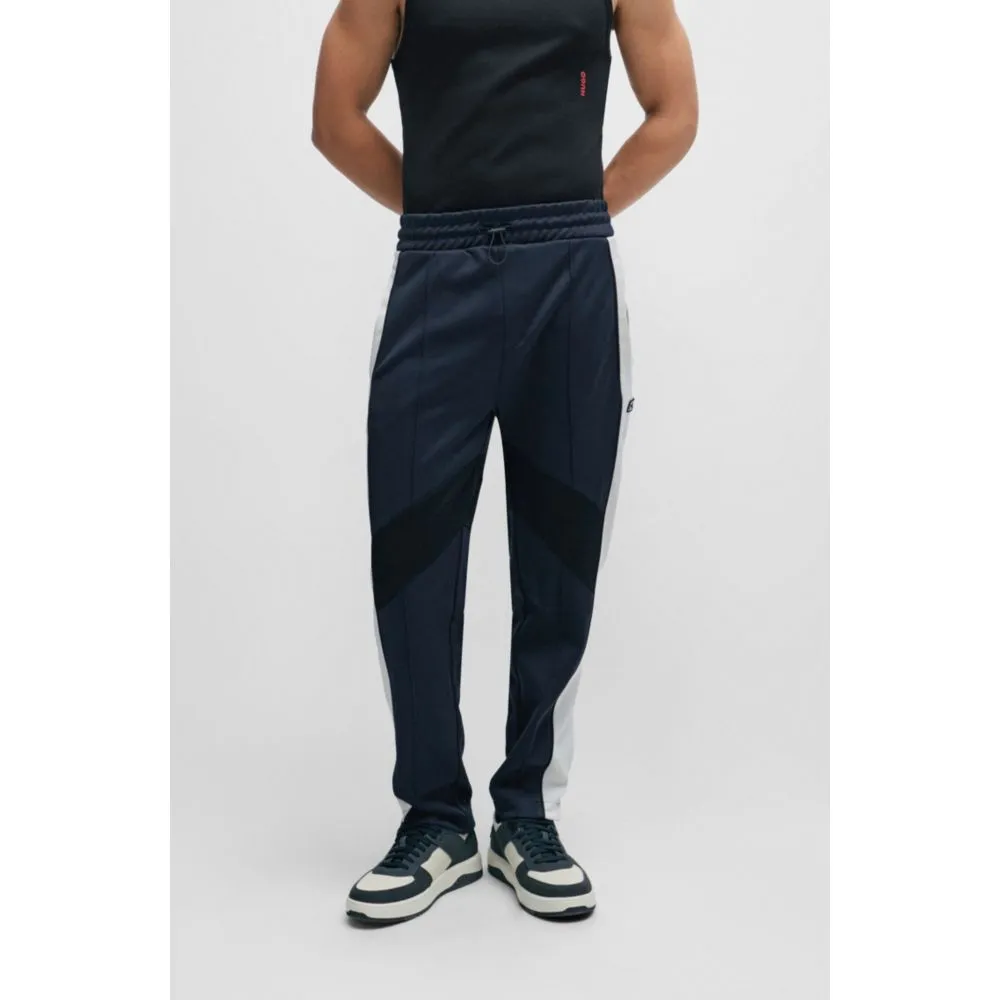 Relaxed-fit tracksuit bottoms with color-blocking