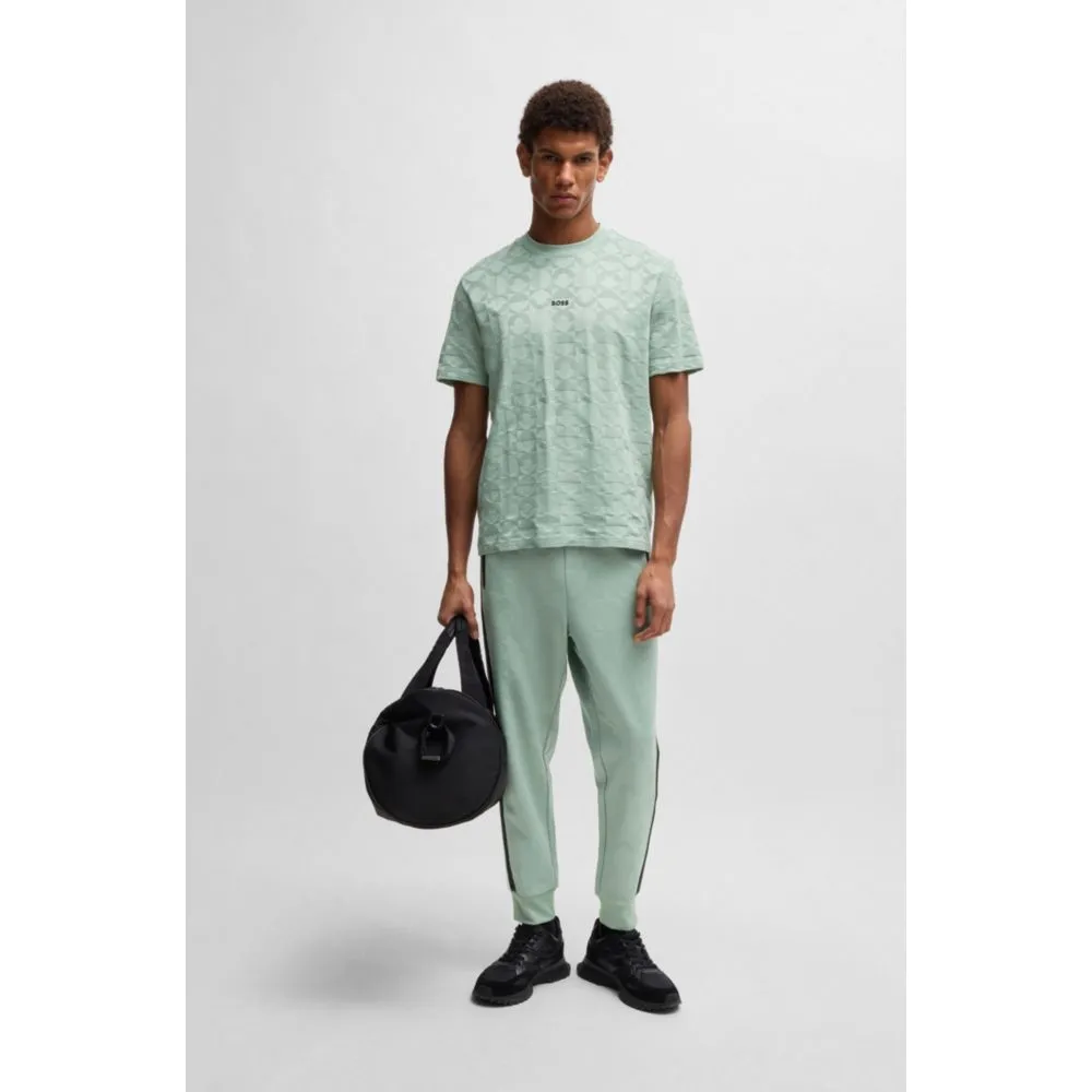 Relaxed-fit tracksuit bottoms with jacquard-woven circles