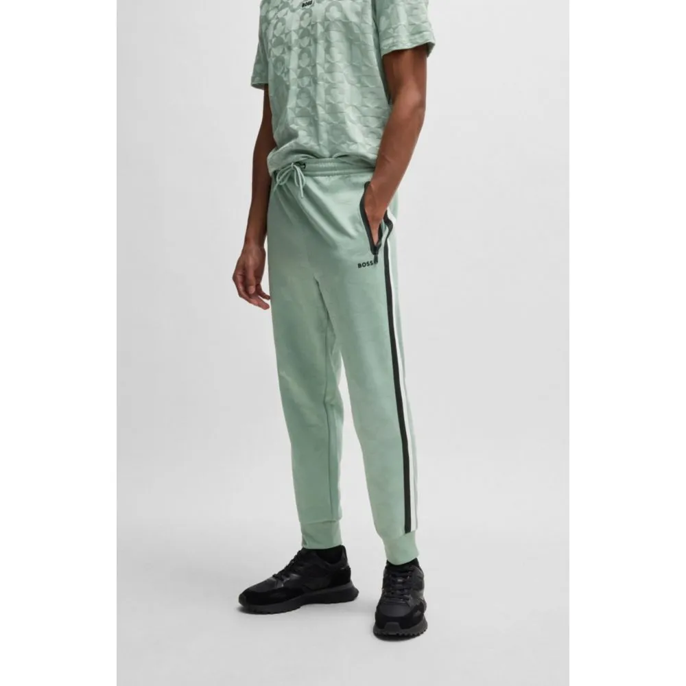 Relaxed-fit tracksuit bottoms with jacquard-woven circles