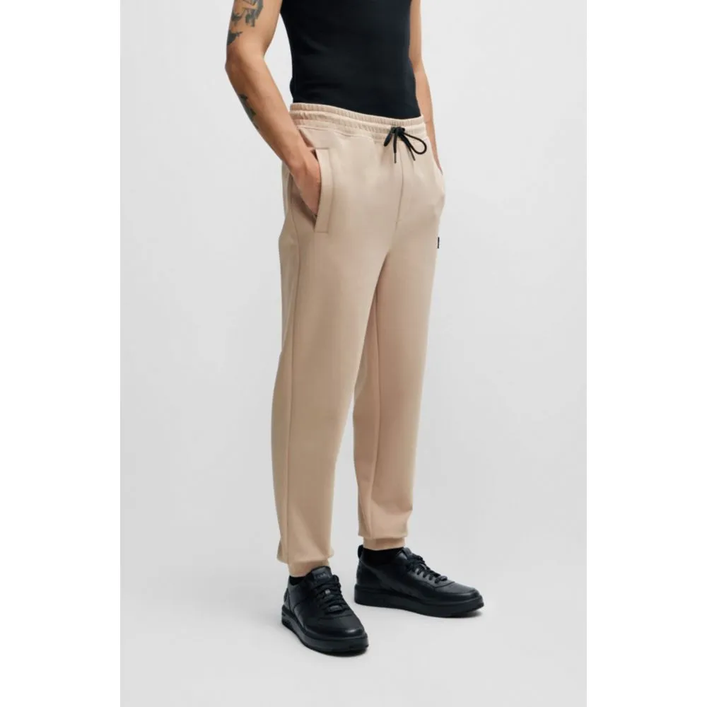 Stretch-cotton tracksuit bottoms with stacked logo